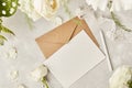 Aesthetic pastel paper background- mock up and envelope for invitation, wishing, postcard, text among white eustoma