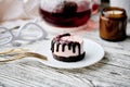 Aesthetics no baking, gluten free and sugar free pink raspberry cake with teapot. Healthy vegan food. Romantic dinner Royalty Free Stock Photo