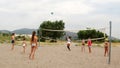 Children play beach volleyball on the beach, Afandou village, Rhodes, Greece