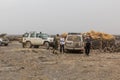 AFAR, ETHIOPIA - MARCH 25, 2019: Tourists in Dodom village under Erta Ale volcano in Afar depression, Ethiop