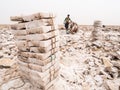 Afar men mining salt from salt flats in Afar region, Danakil Depression, Ethiopia.