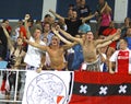 AFC Ajax fans celebrate after scoring a goal