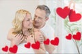 Affectionate couple embracing each other at home Royalty Free Stock Photo