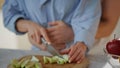 Affectionate couple preparing food at home kitchen closeup. Happy family morning Royalty Free Stock Photo