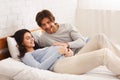 Affectionate husband stroking belly of his pregnant wife Royalty Free Stock Photo