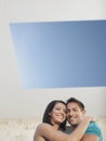 Affectionate Young Couple Under Skylight Royalty Free Stock Photo