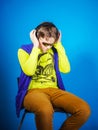 Affective teenage boy listening music in headphones Royalty Free Stock Photo