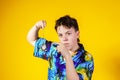 Affective teenage boy with watch showing time Royalty Free Stock Photo