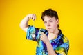 Affective teenage boy with watch showing time Royalty Free Stock Photo