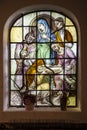 Afferden, Netherlands, May 20, 2021: Stained glass window in the church