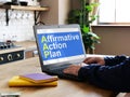 Affirmative Action Plan AAP is shown on the business photo using the text