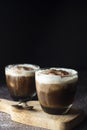 Affogato coffee with ice cream on a glass cup, dark, black background Royalty Free Stock Photo