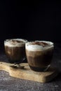Affogato coffee with ice cream on a glass cup, dark, black background Royalty Free Stock Photo