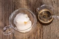 Affogato, espresso coffee and Vanilla ice cream in double walled glass italian dessert, on the rustic wooden table Royalty Free Stock Photo