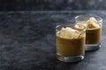 Affogato with Ice Cream, coffee glass with whipped milk, dark background