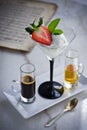 Affogato with with Ice Cream, strawberries, mint leaves, espresso and liqueur on the marble table Royalty Free Stock Photo