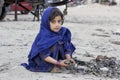 The afghan kids who collects all the rubber from workshops Royalty Free Stock Photo