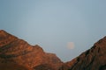 Afghanistan landscape, a mountain with a full moon in the background