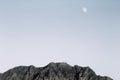 Afghanistan landscape, a mountain with a full moon in the background