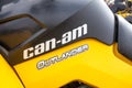 BRP Can Am Outlander logo on yellow black quad bike at Mud Racing contest. ATV SSV motobike
