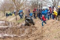 Afipsip, Russia - October 31, 2020: Sportsman on BRP quad bike drives splashing in dirt and water at Mud Racing contest. ATV SSV Royalty Free Stock Photo