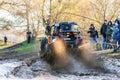 Sportsman on buggy drives splashing in water at Mud Racing contest. ATV SSV motobike Royalty Free Stock Photo