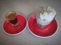 Espresso and ice cream on the wood table. Royalty Free Stock Photo