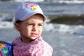 Afraid arab muslim baby girl on beach Royalty Free Stock Photo