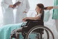 Afraid child on the wheelchair in the hospital Royalty Free Stock Photo