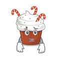 Afraid christmas cupcake in the character fridge Royalty Free Stock Photo