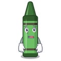 Afraid green crayon in the mascot shape