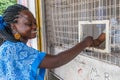 Africa Ghana woman pays for her purchase with distance
