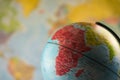 Africa map on a globe with earth map in the background. Royalty Free Stock Photo
