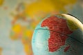 Africa map on a globe with earth map in the background. Royalty Free Stock Photo