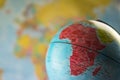 Africa map on a globe with earth map in the background. Royalty Free Stock Photo