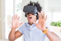 African amaerican man having fun playing with virtual reality glasses Royalty Free Stock Photo