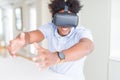 African amaerican man having fun playing with virtual reality glasses Royalty Free Stock Photo
