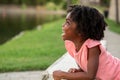 Happy African Amerian little girl smiling outside. Royalty Free Stock Photo