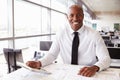 African American architect at work, smiling to camera Royalty Free Stock Photo