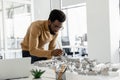 African american architect working in his office and looking busy Royalty Free Stock Photo