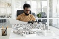 African american architect working in his office and looking busy Royalty Free Stock Photo