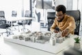 African american architect working in his office and looking involved Royalty Free Stock Photo