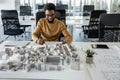 African american architect working in his office and looking involved Royalty Free Stock Photo