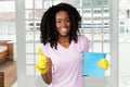 African american au pair girl cleaning room