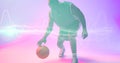 African american basketball player dribbling ball by illuminated wave patterned lines
