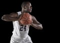 African American Basketball Player holding a ball