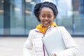 African american black female girl student remote studing, working, using laptop outdoor. back to school. Royalty Free Stock Photo