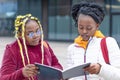 African american black female student help to studing, looking in notebook, book. back to school. Royalty Free Stock Photo