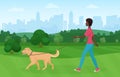 African american black woman walking with golden terrier dog pet in the park