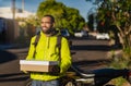 African American with box for delivery